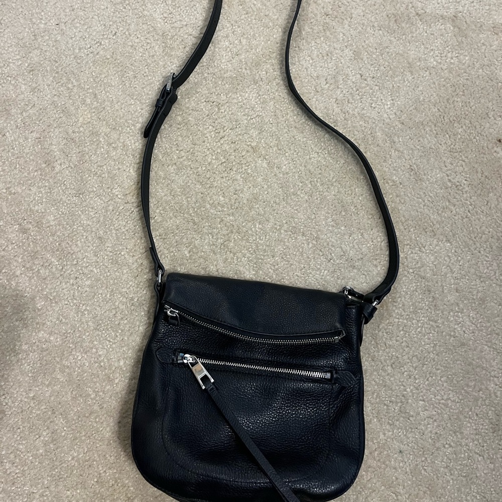 Black Vince Camuto purse. Used one time in excellent condition.